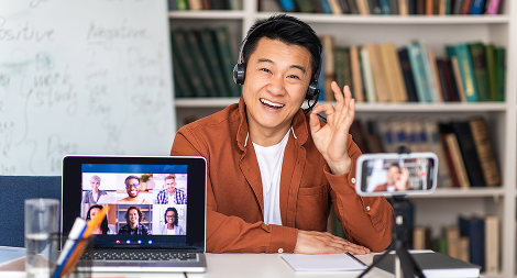 Learn Masters asian teacher teaching online gesturing okay having video call indoor 1